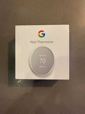 Google Nest Thermostat in White and Silver Accents with trim kit